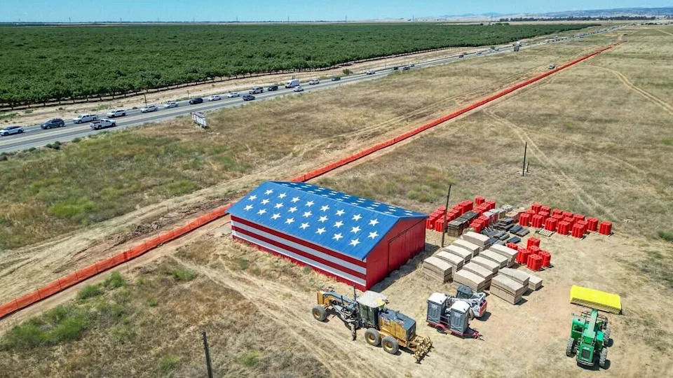 Construction equipment is staged near the Stars and Stripes barn on Highway 41 at Avenue 12 in Madera County on Tuesday, June 9, 2026. Construction has begun on a major project that will widen and improve Highway 41 spanning more than four miles between Avenue 10 1/2 and Avenue 15.