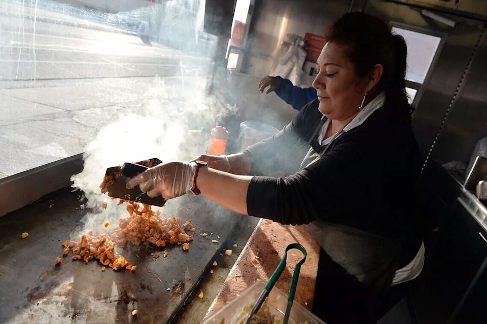 La Jacka Mobile food truck owner/cook Miriam Martinez cooks chopped, unripe jackfruit on the grill to make meatless dishes on Friday, Jan. 6, 2017, in Fresno. La Jacka was ranked by Yelp in 2017 as one of the top Mexican restaurants in Fresno.