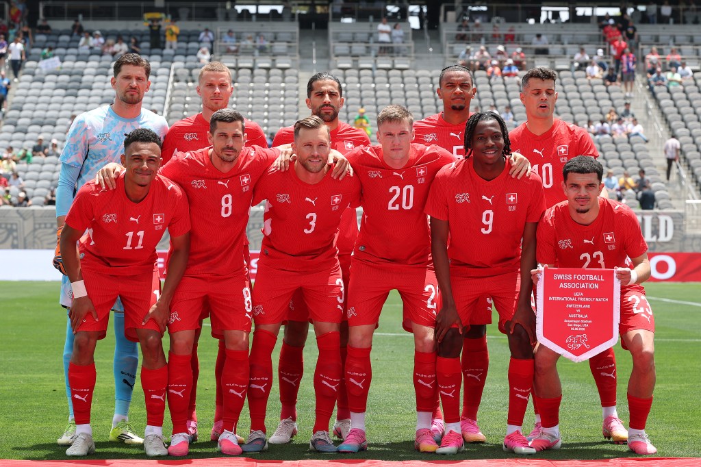 The Swiss football team poses for a group photo before their international friendly match against Australia.