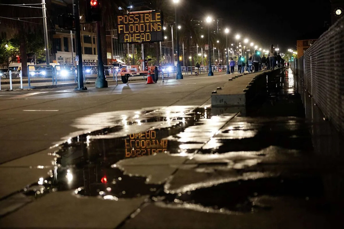 Sea water floods S.F.'s Embarcadero amid predictions of record summer tides