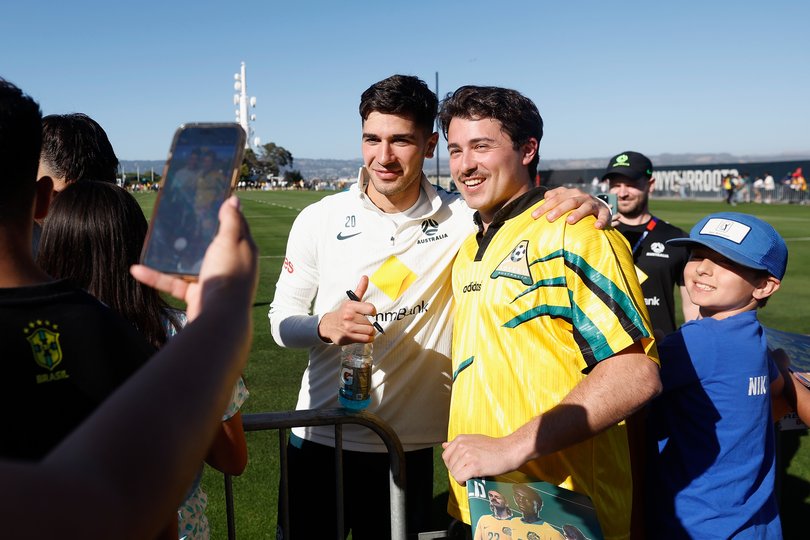ALAMEDA, CALIFORNIA - JUNE 03: Cristian Volpato #20 of Australia poses for a photo with fans after a training session at Oakland Roots and Soul Sports Club on June 03, 2026 in Alameda, California. (Photo by Lachlan Cunningham/Getty Images)