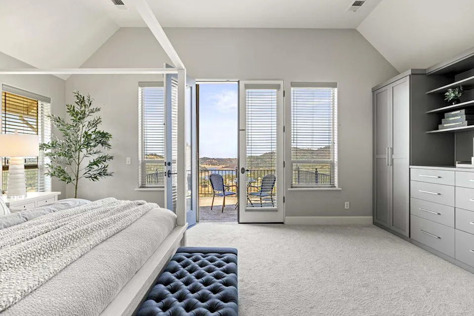 A bedroom with views at the 2001 Salmon Valley residence.