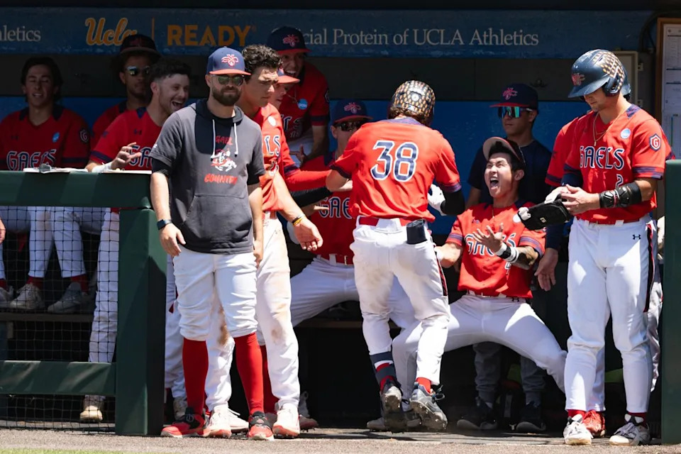 Saint Mary's College catcher Ian Armstrong (38) celebrates with team mates after scoring a homerun during an NCAA regional championship elimination game between the Saint Mary's College Gaels and UCLA Bruins on May 31, 2026 at Jackie Robinson Stadium in Los Angeles Calif.