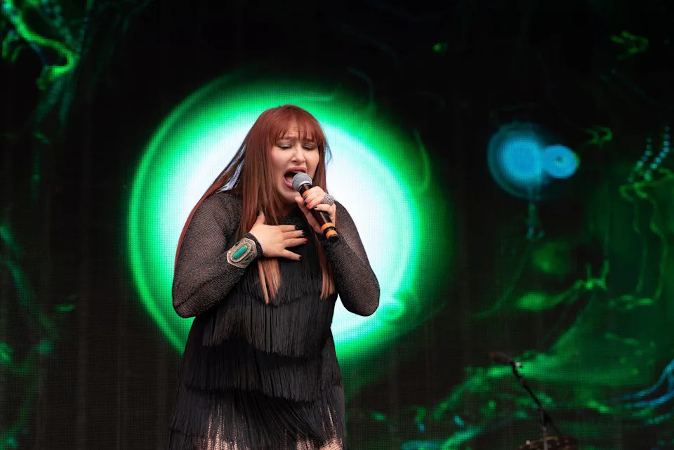 Tiffany performing on stage at Rewind Festival South in Henley-on-Thames, England