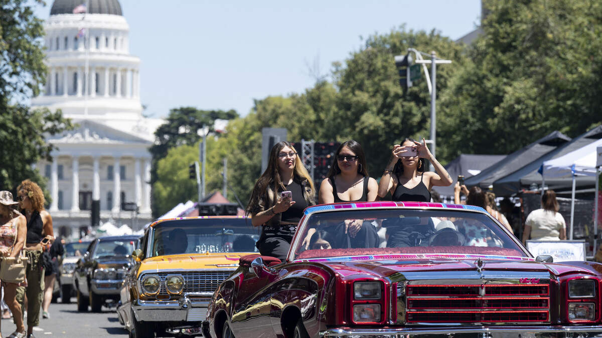 Sacramento lowriders celebrate holiday cruise on Capitol Mall
