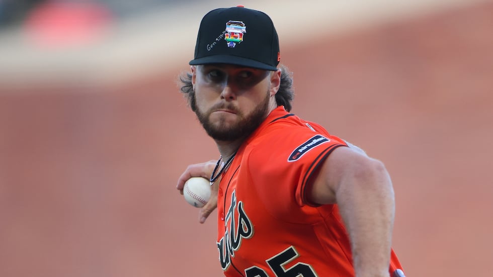 San Francisco Giants pitcher Landen Roupp throws to a Chicago Cubs batter during the first...