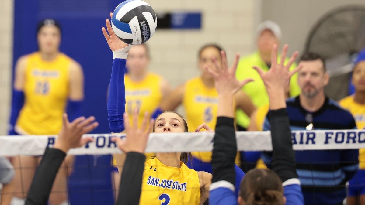 Blaire Fleming of San Jose State Spartans attacking the net during volleyball match.