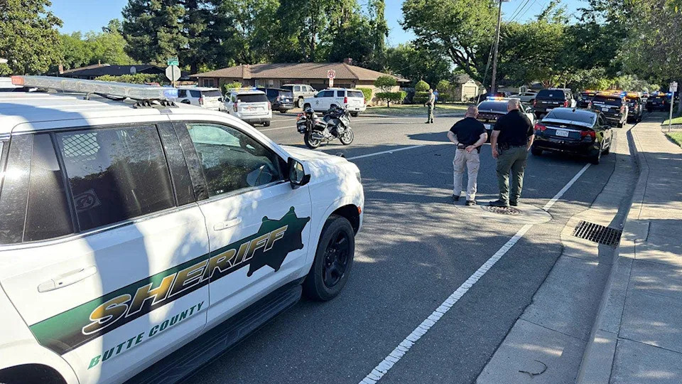 Law enforcement personnel blocking East First Avenue between Sherman Avenue and Sheridan Avenue in Chico, Calif.