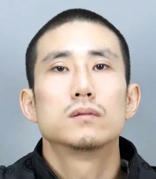 Myung Jin Kim, 31, was captured in Laos in May and brought back to Los Angeles on Wednesday. San Jose Police Department