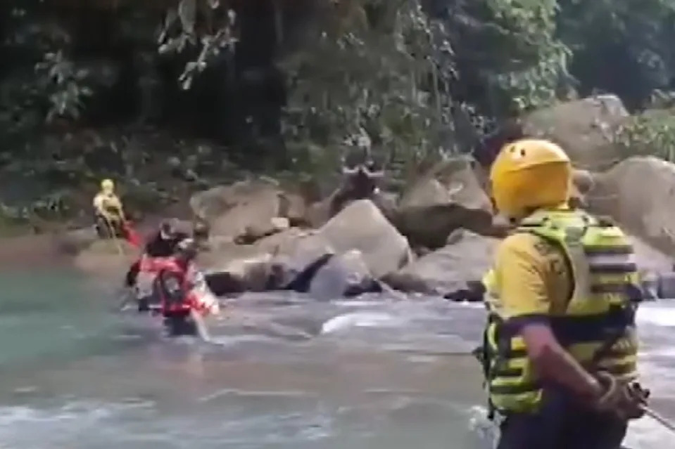 The body has not been confirmed to be Phillips. A video showed harnessed rescuers taking a body out of a river in the country. Benemerito cuerpo bomberos de costa rica