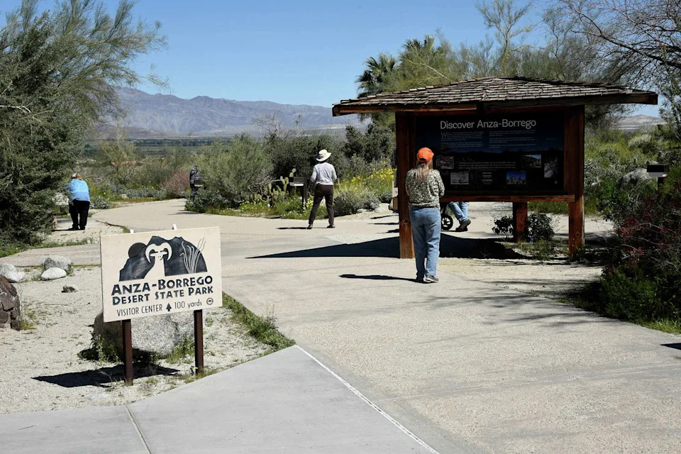 FILE: Visitors read the signage at the entrance to Anza-Borrego Desert State Park in Borrego Springs, Calif. (Paul Harris/Getty Images)