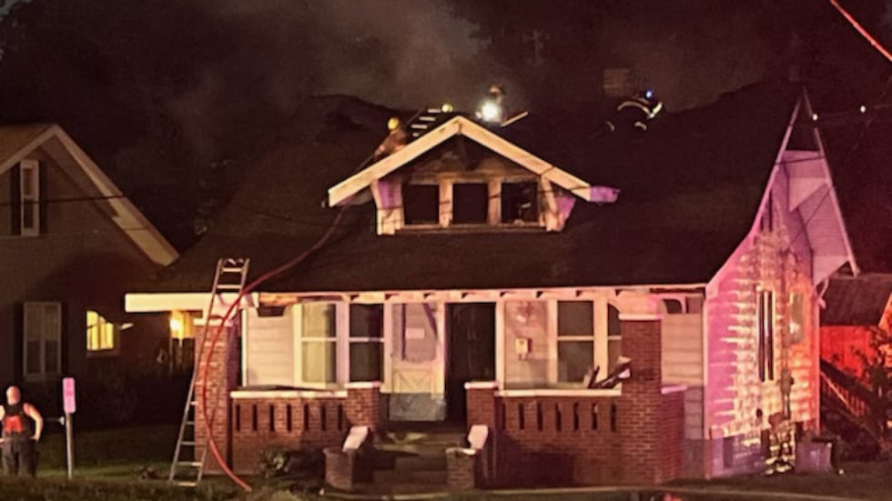 Firefighters work to put out house fire in Oakland City Tuesday