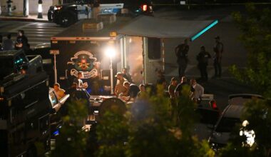 Law enforcement respond after a man barricaded himself inside a building with hostages, June 2, in Bakersfield, Calif.