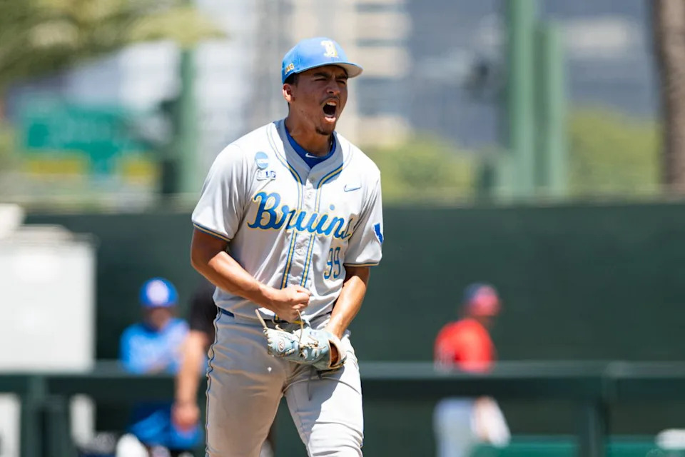 UCLA Bruins right-hand-pitcher Angel Cervantes (99) celebrates after an inning during an NCAA regional championship elimination game between the Saint Mary's College Gaels and UCLA Bruins on May 31, 2026 at Jackie Robinson Stadium in Los Angeles Calif.