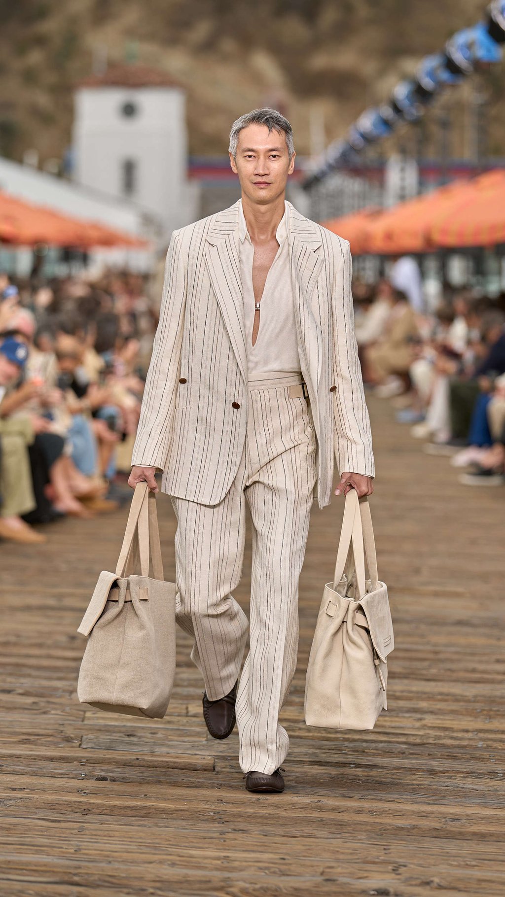 The show opened with a pinstriped look in a loose cut. Photo: Handout