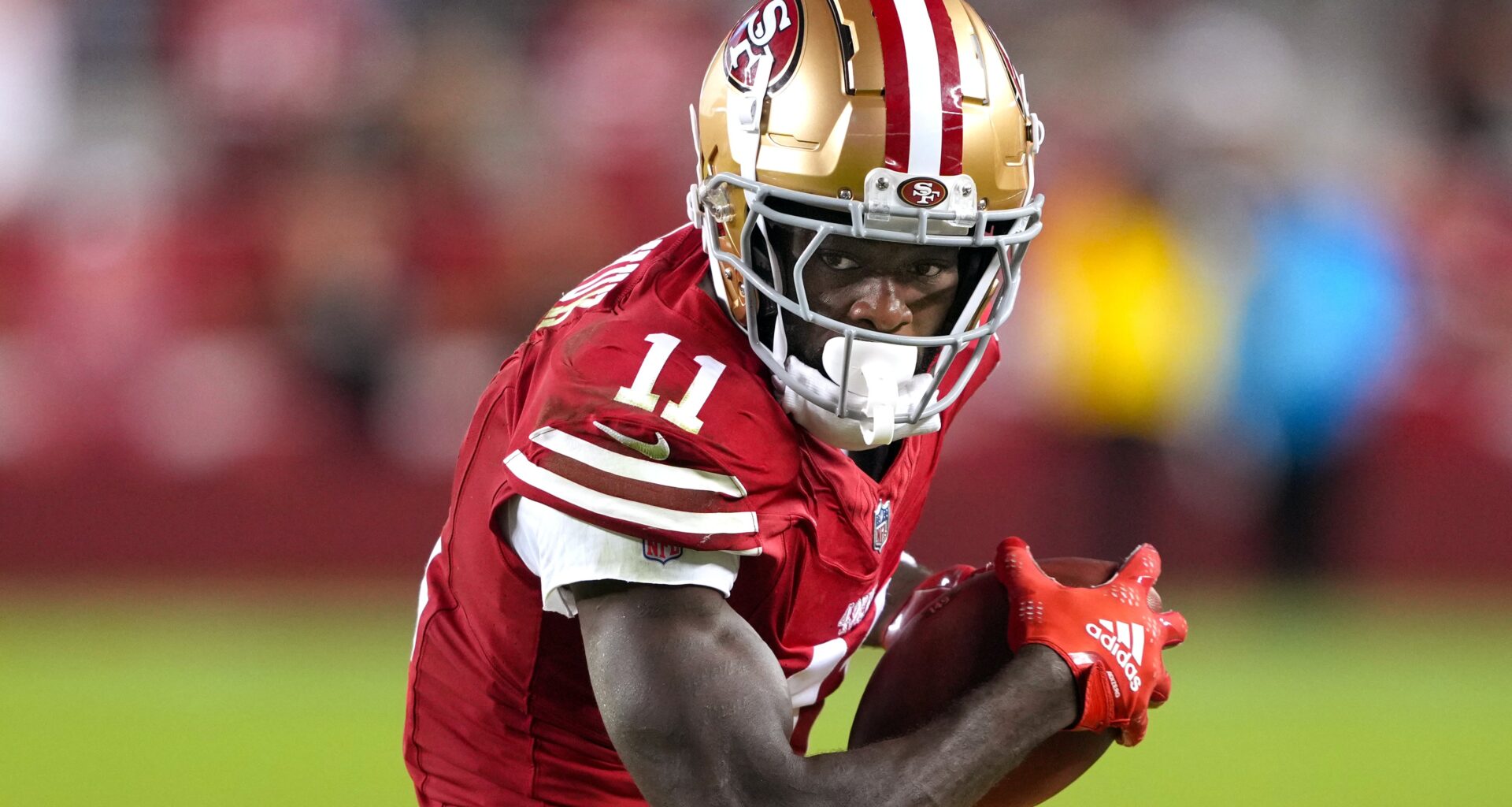 San Francisco 49ers wide receiver Brandon Aiyuk (11) runs after a catch against the New York Jets during the fourth quarter at Levi's Stadium.
