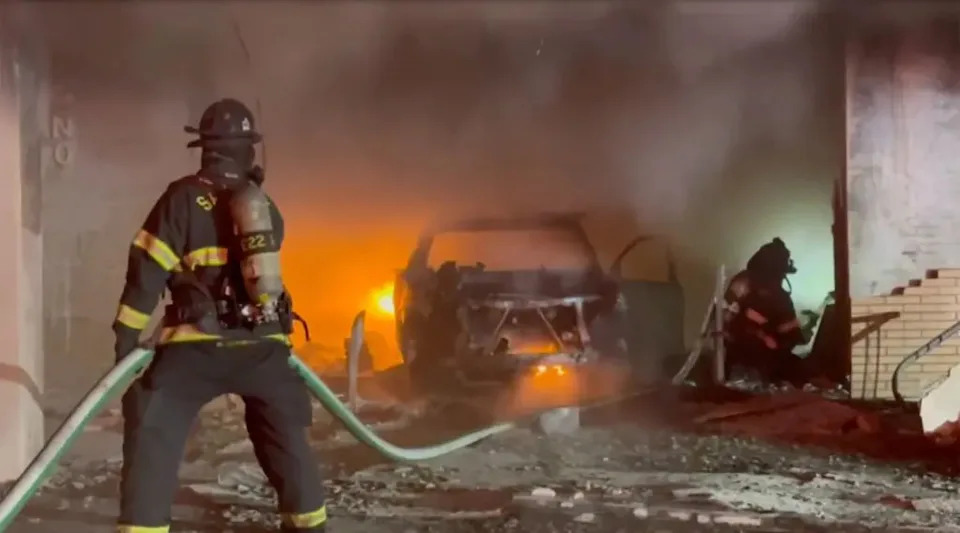 Tillman spread lighter fluid throughout the car, lighting it on fire and fleeing the scene, officials said. CBS