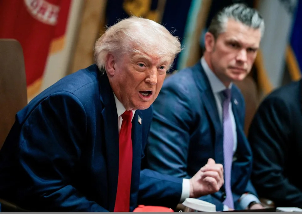 President Donald Trump speaks next to Defense Secretary Pete Hegseth during a cabinet meeting in the Cabinet Room at the White House. REUTERS