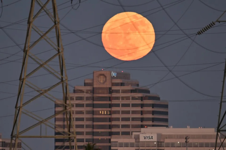 The blue moon is seen in all its dazzling glory rising over Foster City in the Bay Area. Anadolu via Getty Images
