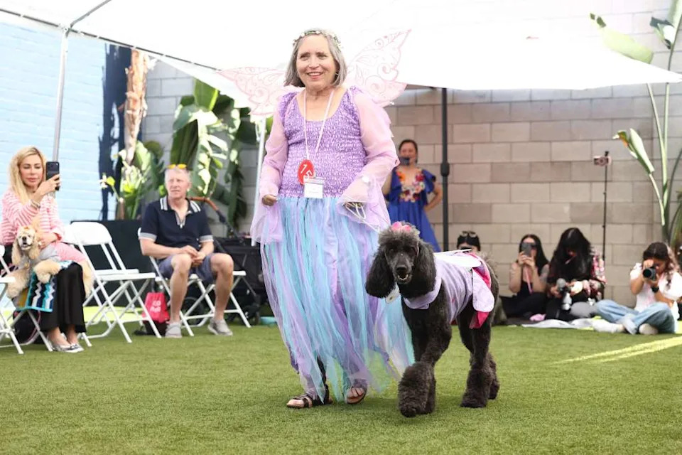 Margo Dare and her dog Shayna, both dressed in fairy costumes. Jonathan Alcorn for CA Post