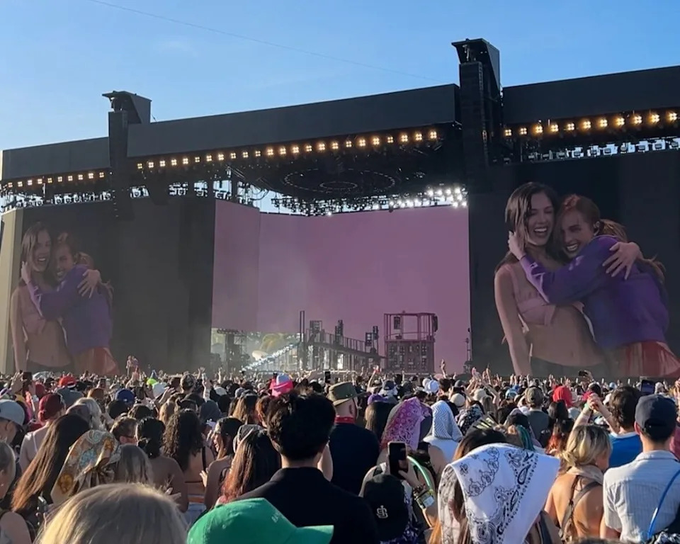 Olivia Rodrigo hugs Addison Rae after performing "Headphones On" and Rodrigo's new single, "Drop Dead," at the Coachella Valley Music and Arts Festival on Saturday, April 18.