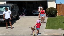 David and Kayla Rykbos spend time together, Saturday, following two seperate close calls with wildfire in the past week, Oceanside, Calif., June 13, 2026.