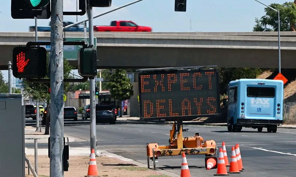 Northbound traffic along Abby Street as it approaches Freeway 180 is warned of delays due to construction to reduce the three vehicle lanes to two in each direction. Photographed Tuesday, June 16, 2026 in Fresno.