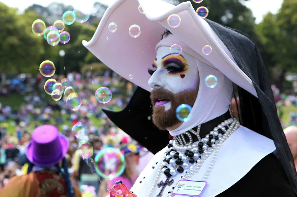 Sister Candy Cide blows bubbles at Dolores Park during the annual Easter celebration that includes the Hunky Jesus contest. The documentary "Hunky Jesus" captures this San Francisco tradition and the drag activists behind it. (Kevin Johnson/S.F. Chronicle)