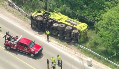 Priority Waste truck crashes into guardrail, tips over in Oakland Township