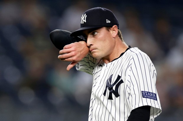New York Yankees pitcher Ron Marinaccio reacts during the ninth inning of a baseball game against the Milwaukee Brewers, Saturday, Sept. 9, 2023, in New York. (AP Photo/Adam Hunger)