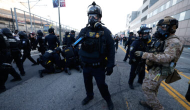 DHS police detain a protestor near the Metropolitan Detention Center in downtown Los Angeles during a "No Kings" protest Saturday, March 28, 2026. (AP Photo/Jill Connelly)