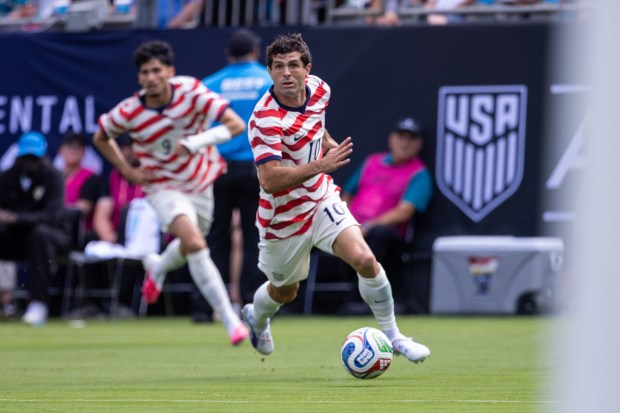 United States forward Christian Pulisic dribbles into the box against Senegal during the first half of an international friendly soccer match Sunday, May 31, 2026, in Charlotte, N.C. (AP Photo/Scott Kinser)