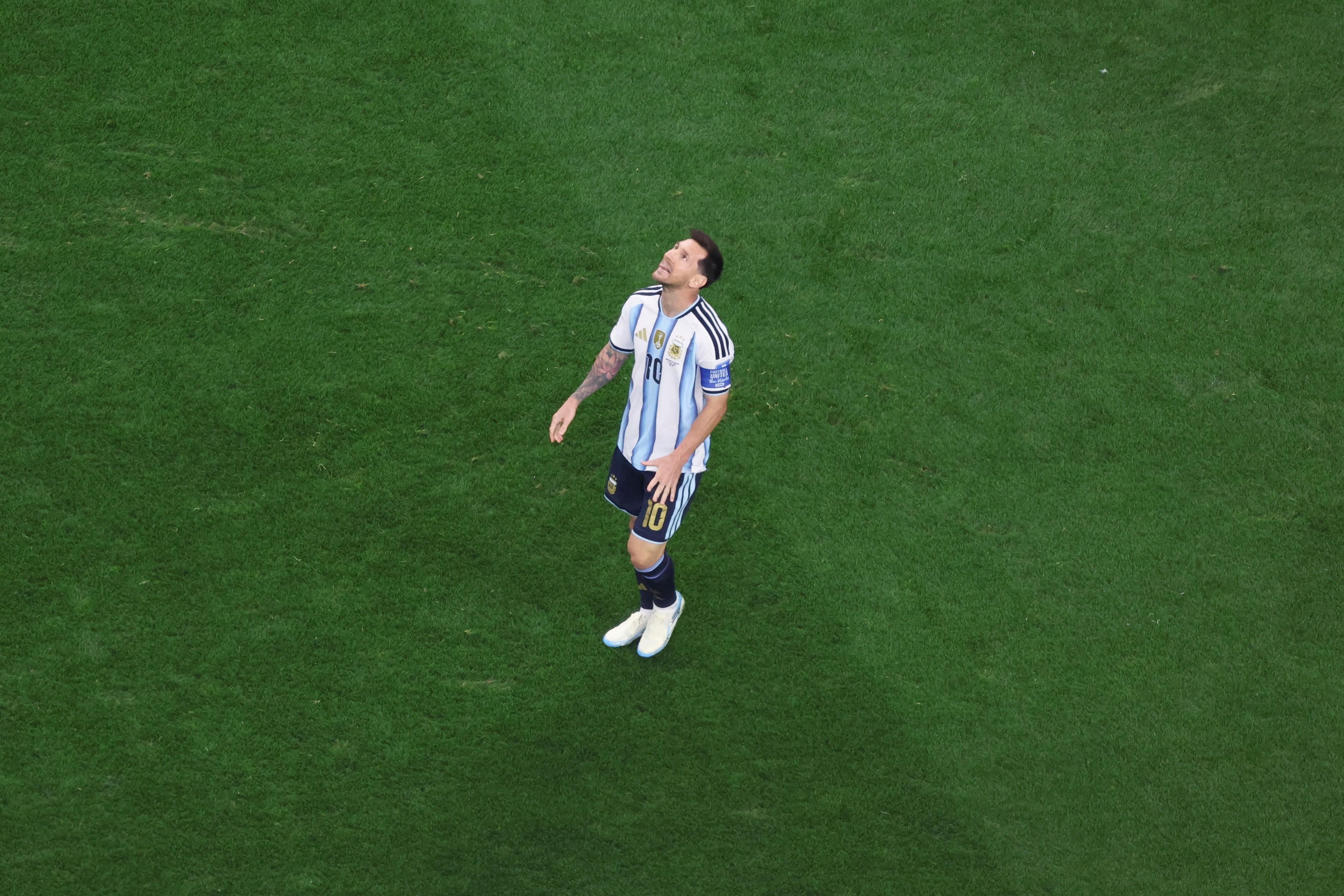 Argentina’s Lionel Messi reacts after failing to score a penalty...