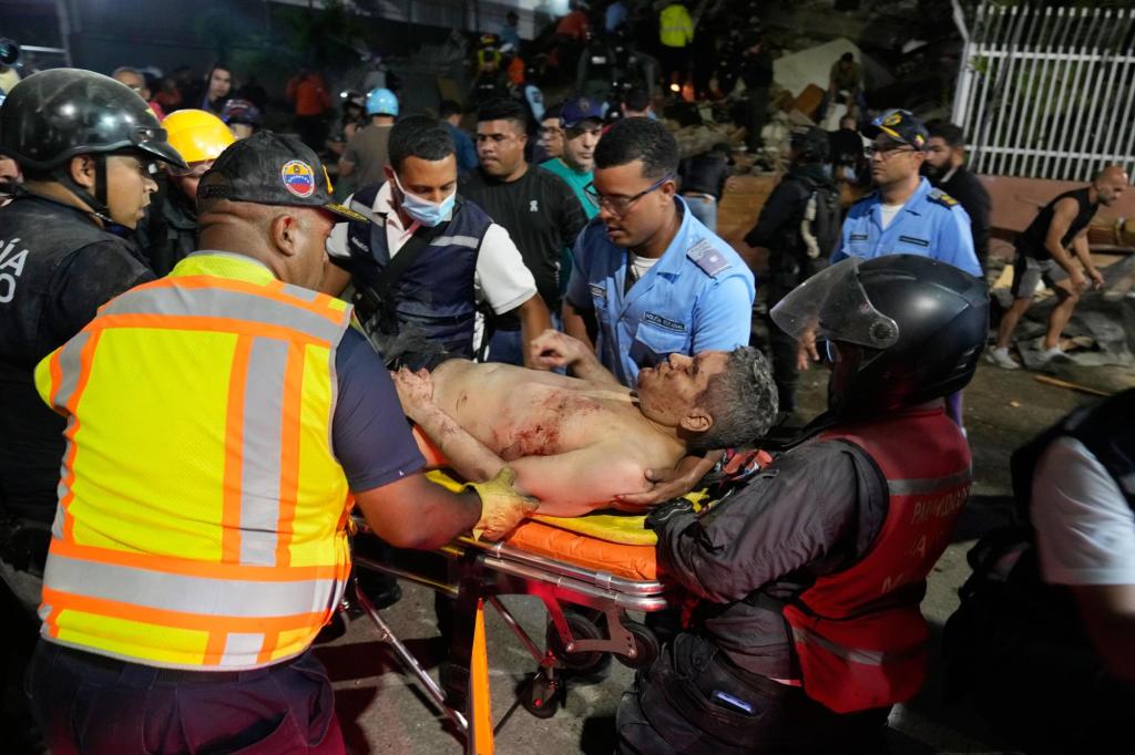 At least 164 dead and 971 injured after powerful quakes rock Venezuela