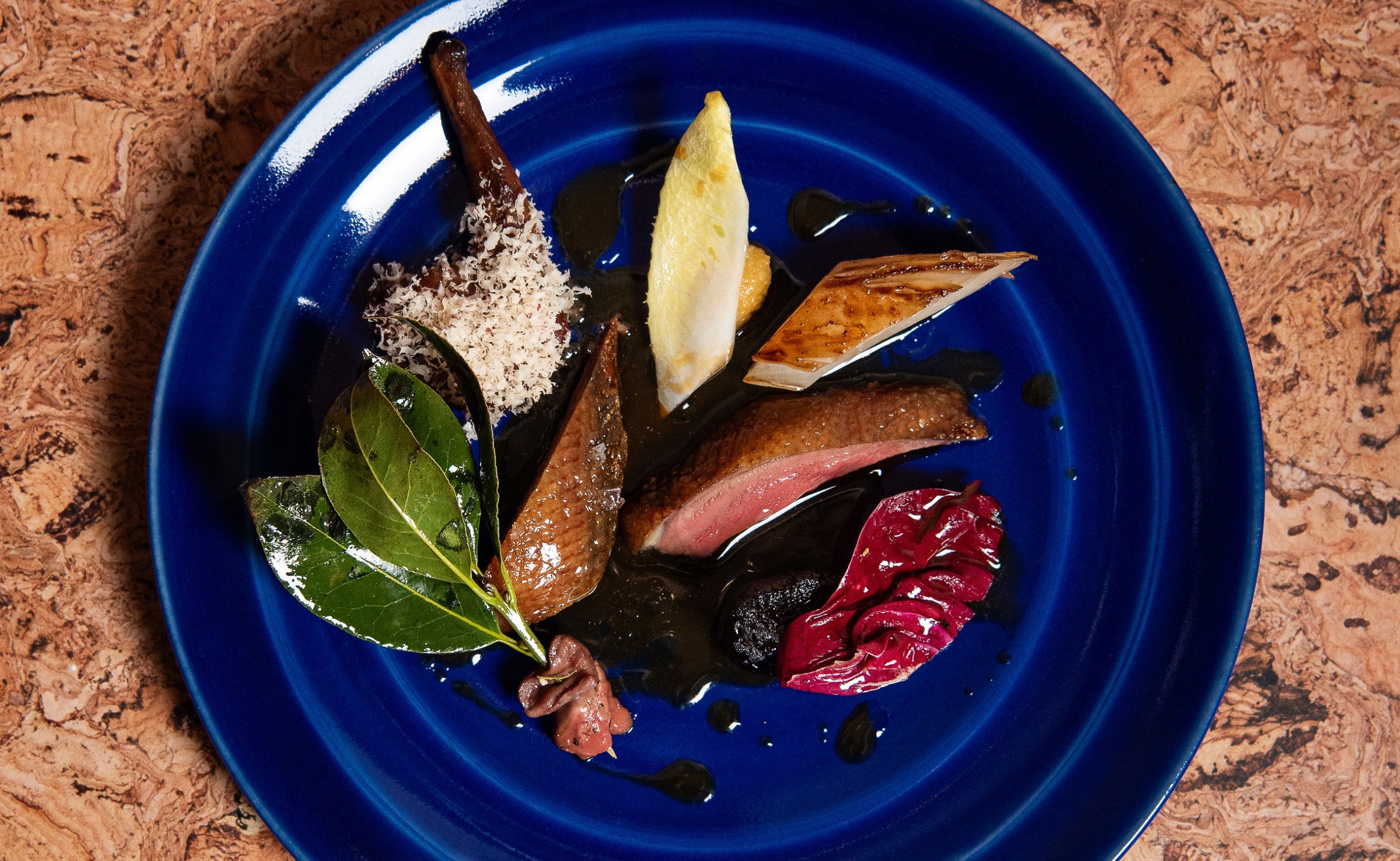 Aged squab with yuzu pepper, bitter greens, and beets at Lielle.