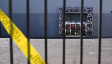 Caution tape hangs outside Ambiance Apparel after federal immigration authorities conducted an operation on Friday, June 6, 2025, in Los Angeles. (AP Photo/Jae C. Hong)