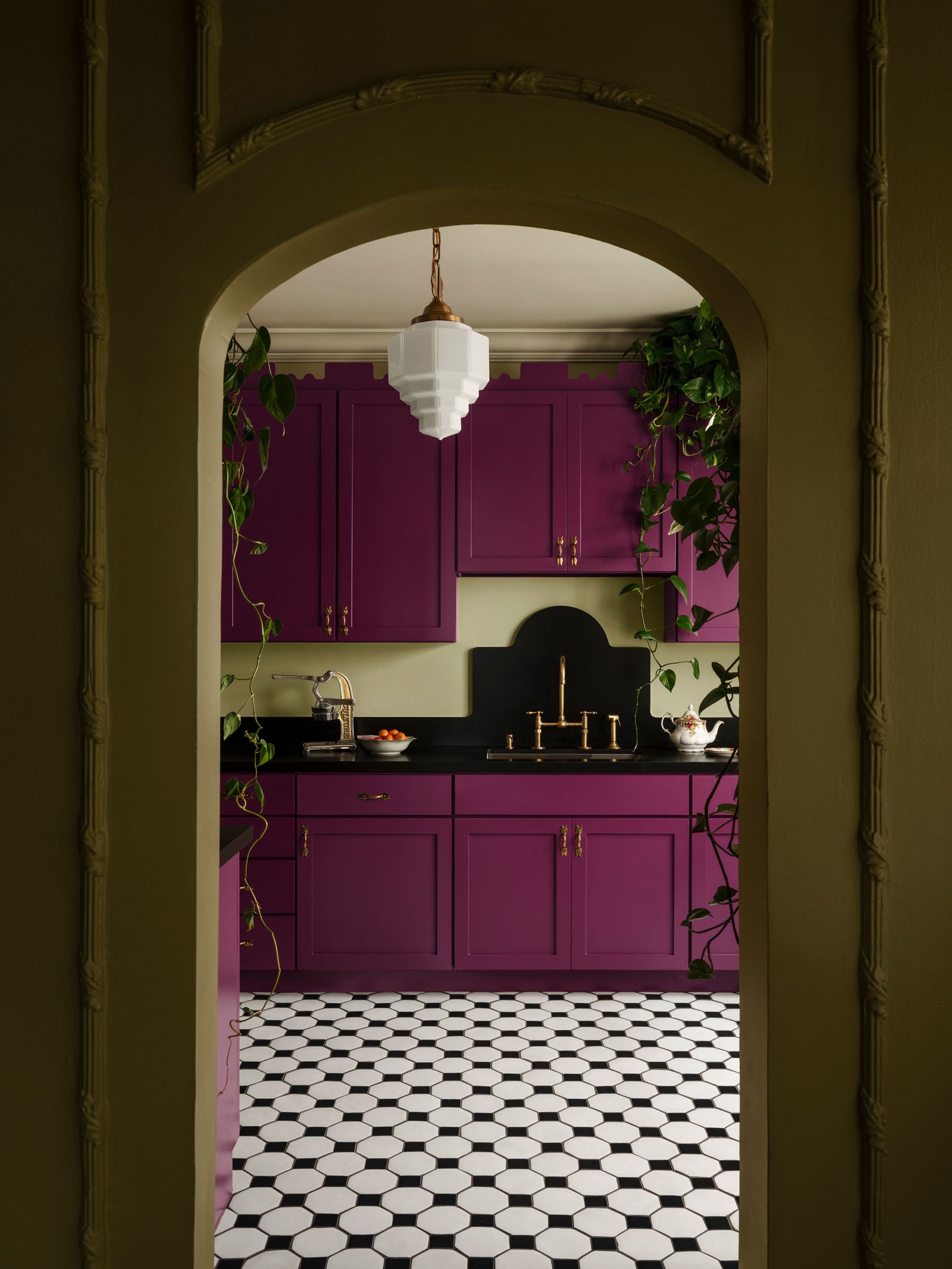 Image may contain Floor Indoors Interior Design Flooring Arch Architecture Kitchen Home Decor Chandelier and Lamp
