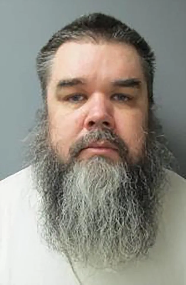 Anthony Scott Searles-Harris has been identified as the man who took 10 people hostage inside a Chase Bank building in Bakersfield, California