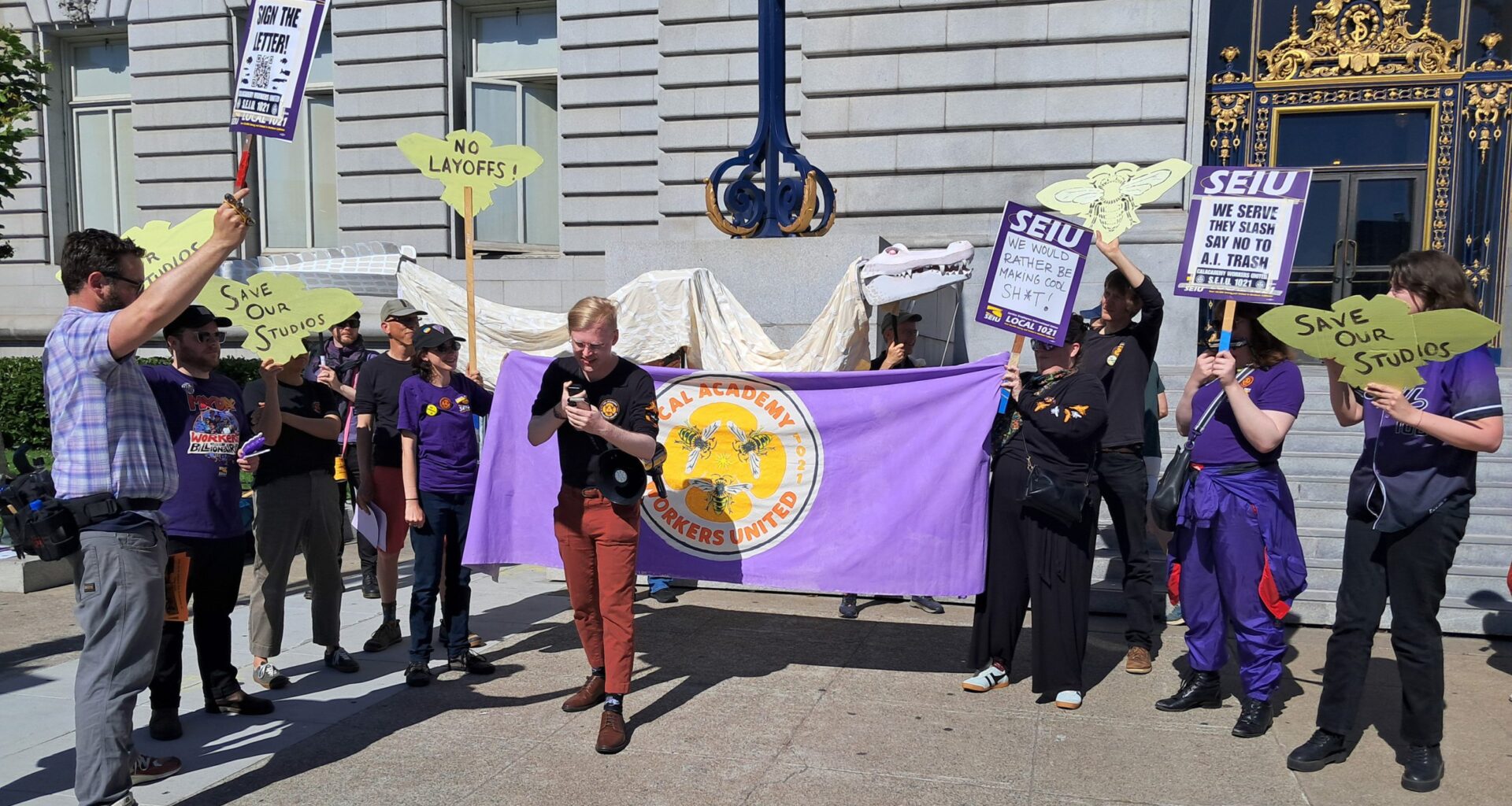 Cal Academy workers rally in San Francisco for financial audit following layoffs