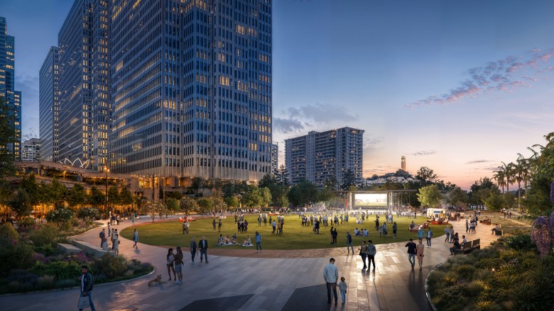 A vibrant urban plaza at dusk, bustling with people enjoying a grassy field surrounded by illuminated skyscrapers and lush greenery.
