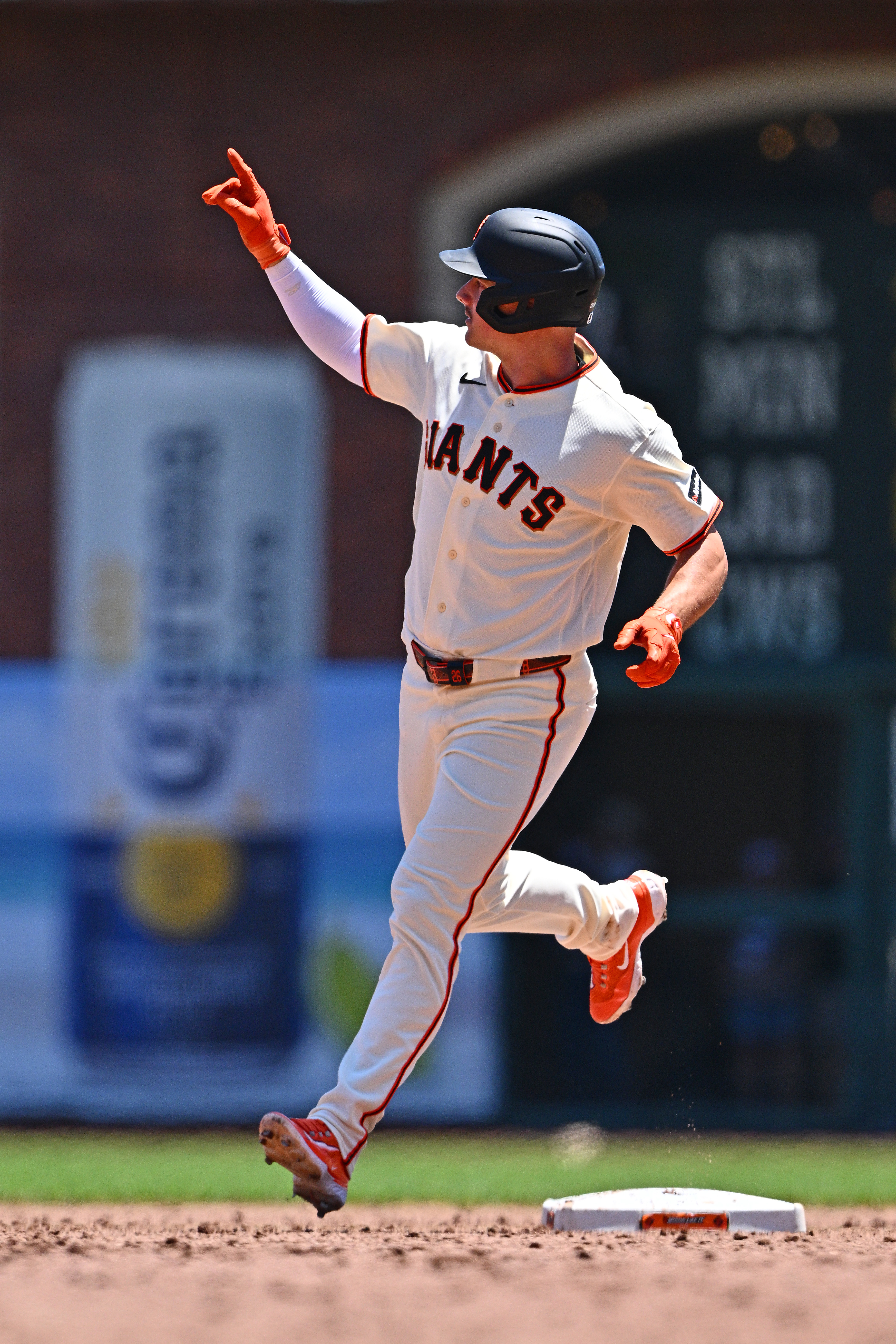 San Francisco Giants' Matt Chapman (26) gestures after hitting a...