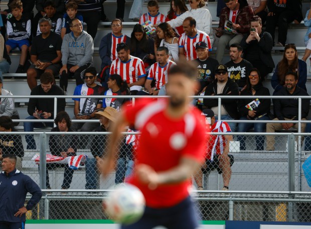 Soccer fans, some wearing Paraguay jersey's, watch Paraguay's national soccer team train at San Jose State University's Spartan Soccer Complex in preparation for the FIFA World Cup in San Jose, Calif., on Monday, June 8, 2026. (Nhat V. Meyer/Bay Area News Group)