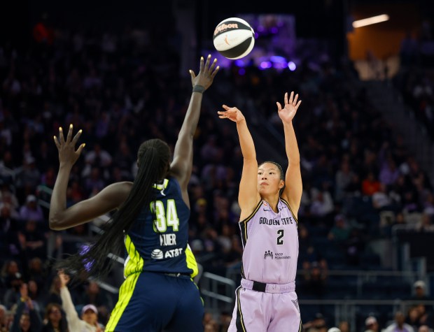 Golden State Valkyries' Kaitlyn Chen (2) scores a 3-point basket against Dallas Wings' Awak Kuier (34) in the second quarter at the Chase Center in San Francisco, Calif., on Wednesday, June 17, 2026. (Nhat V. Meyer/Bay Area News Group)