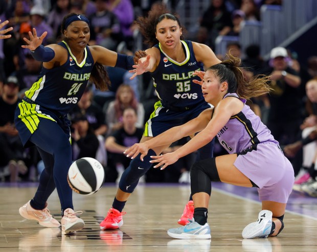 Golden State Valkyries' Kaitlyn Chen (2) passes the ball against Dallas Wings' Arike Ogunbowale (24) and Dallas Wings' Azzi Fudd (35) in the fourth quarter at the Chase Center in San Francisco, Calif., on Wednesday, June 17, 2026. (Nhat V. Meyer/Bay Area News Group)