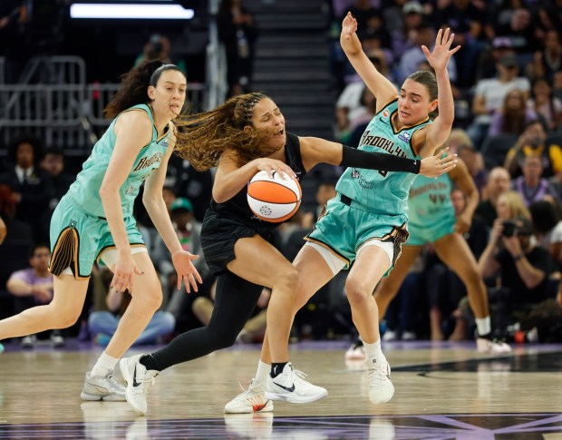 Golden State Valkyries' Veronica Burton (22) dribbles against New York Liberty's Pauline Astier (18) in the fourth quarter at the Chase Center in San Francisco, Calif., on Sunday, June 28, 2026. (Nhat V. Meyer/Bay Area News Group)