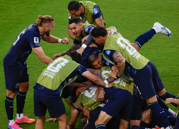 Paraguay dogpiles on Paraguay's Matías Galarza (23) after he scores a goal against Turkey in the first half of a FIFA World Cup match at Levi's Stadium in Santa Clara, Calif., on Friday, June 19, 2026. (Shae Hammond/Bay Area News Group)