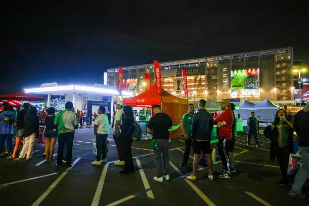 Fans stand in line at a Bank of America promotional display outside Levi's Stadium in Santa Clara, Calif., after a FIFA World Cup match between Paraguay and Turkey on Friday, June 19, 2026. (Ray Chavez/Bay Area News Group)