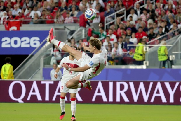 Turkey's Kenan Yildiz (11) goes up for a bicycle kick against the Paraguay during the first half of a FIFA World Cup match at Levi's Stadium on Friday, June 19, 2026. (Ray Chavez/Bay Area News Group)