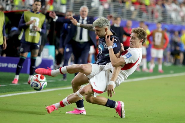 Paraguay's Julio Enciso (19) and Turkey's Kenan Yildiz (11) fight for the ball during the second half of a FIFA World Cup match at Levi's Stadium on Friday, June 19, 2026. (Ray Chavez/Bay Area News Group)