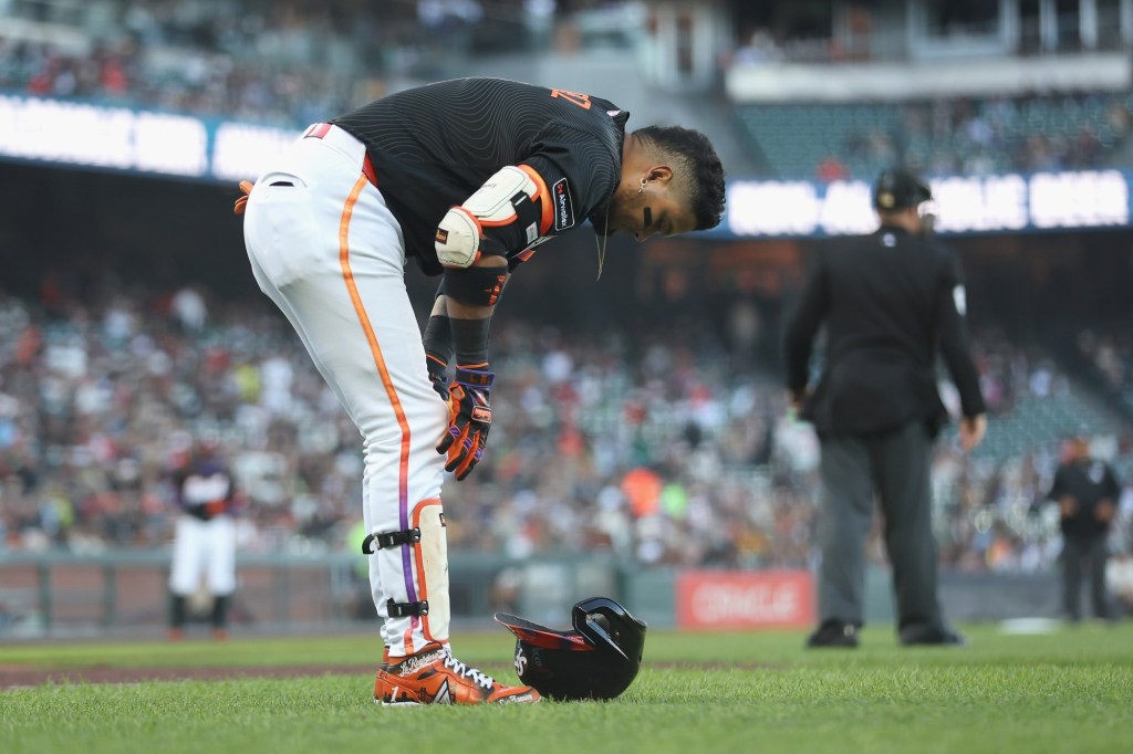 SF Giants' Luis Arraez leaves game after fouling ball off right foot